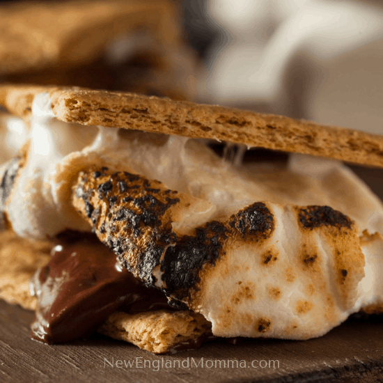 a traditional s'mores 2 graham crackers, toasted marshmallow and a chocolate bar smooshed together