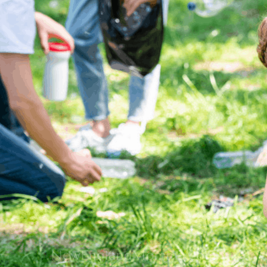 Picking up trash at a campsite