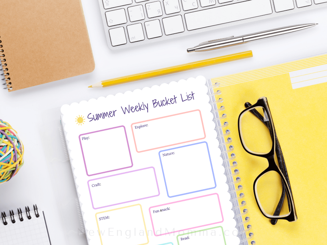 A desk with planning tools and a notebook 