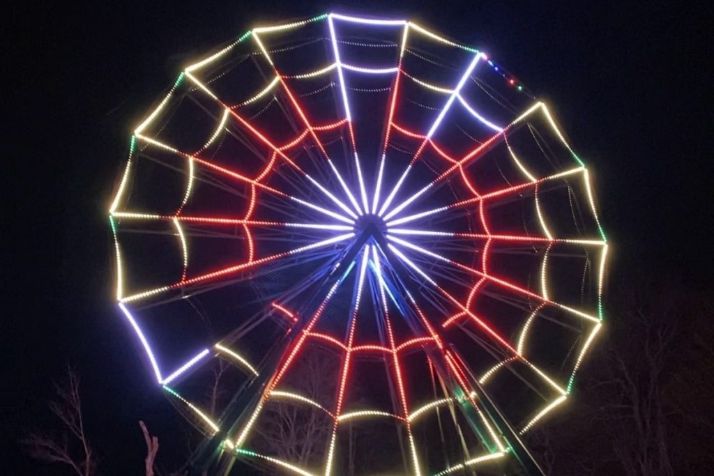 An 85 foot Ferris wheel lit up for Christmas time