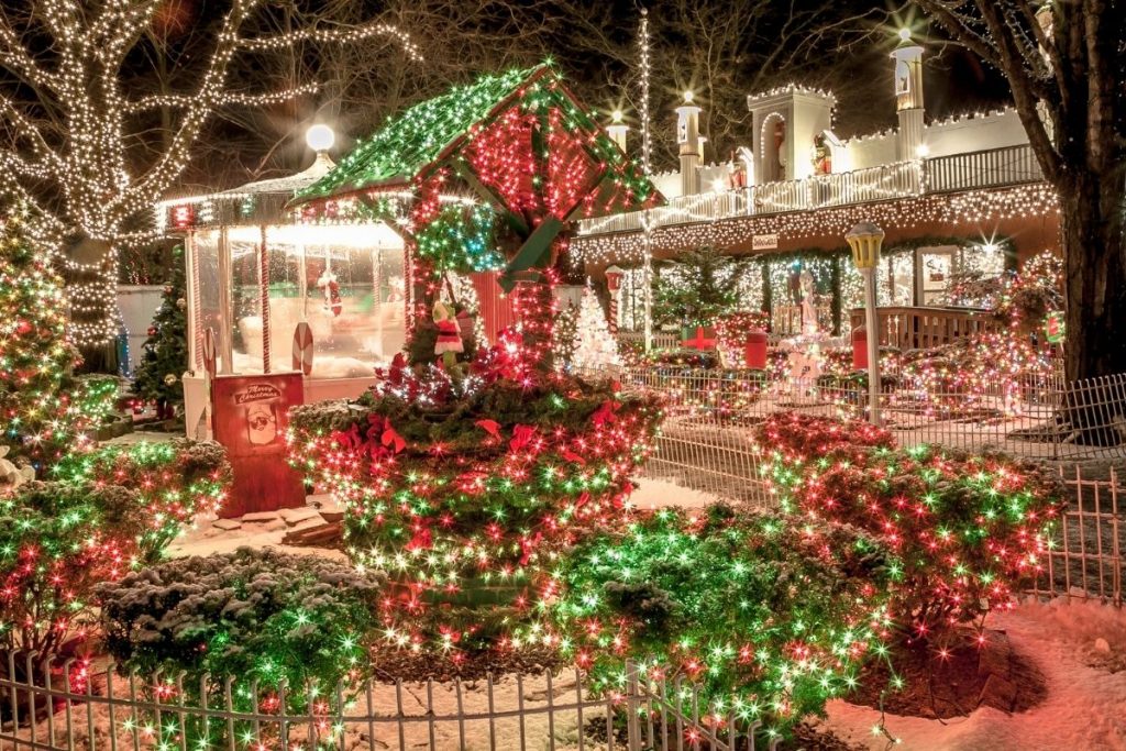 A festive outdoor stores decked out in white, red and white lights for the holiday season