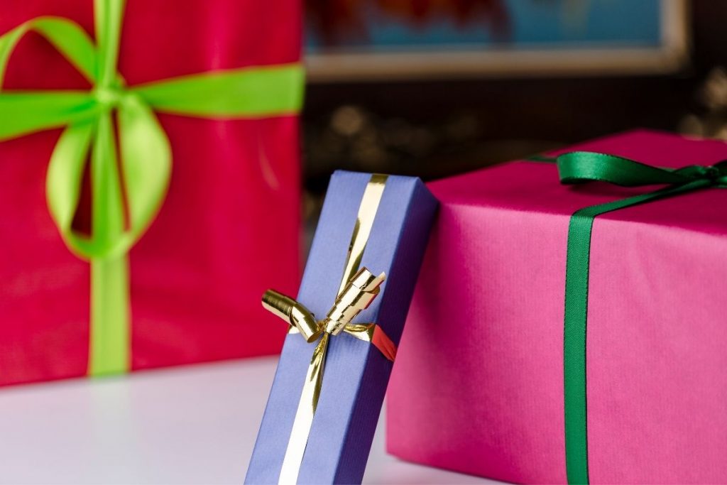 Three gift boxes wrapped with  bows